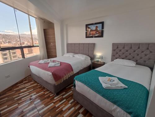 Cama o camas de una habitación en Templo Home