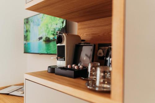 Dapur atau dapur kecil di Les Chambres Guest House