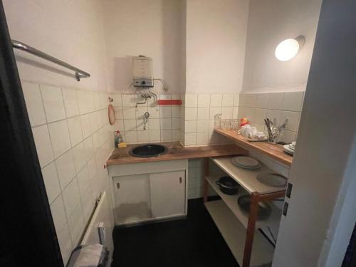 Kuchyň nebo kuchyňský kout v ubytování Zentral Quartier Hannover