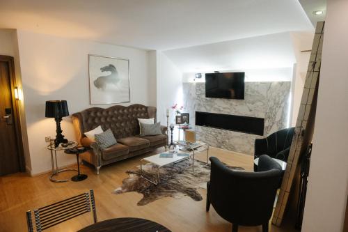 Χώρος καθιστικού στο Andromeda Boutique Hotel 