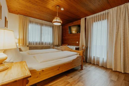 Una cama o camas en una habitación de Zudrellhus