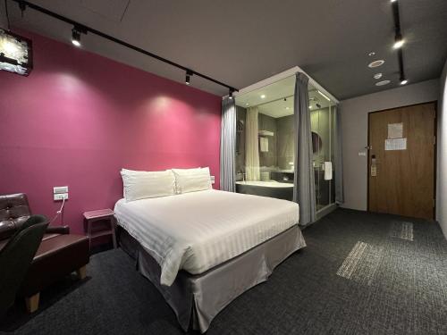 Postel nebo postele na pokoji v ubytování Cho Hotel 3