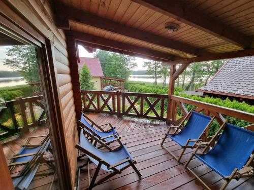 Balkón nebo terasa v ubytování Domek nad jeziorem nr 3 Ryn Mazury