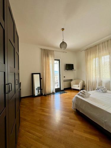 Ένα ή περισσότερα κρεβάτια σε δωμάτιο στο Il Saretto