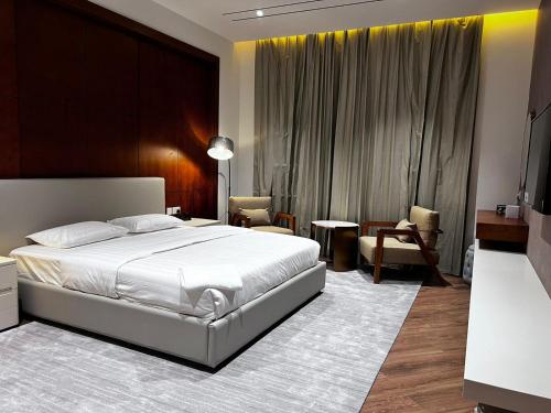 Postel nebo postele na pokoji v ubytování فندق الياس - Yas Hotel