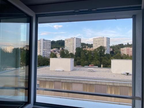 a view of a city from a window at Soran in Montagibert