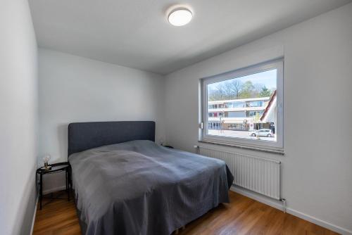Ένα ή περισσότερα κρεβάτια σε δωμάτιο στο Haus Kehrwieder Nordlicht