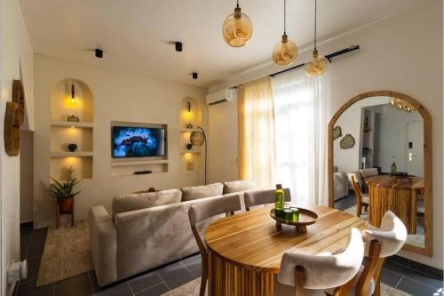 a living room with a couch and a table at Nafsi Nomad in Paje