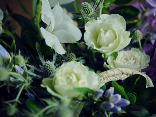 a bouquet of white flowers in a vase at YAWN YARD Kouri Island in Kouri