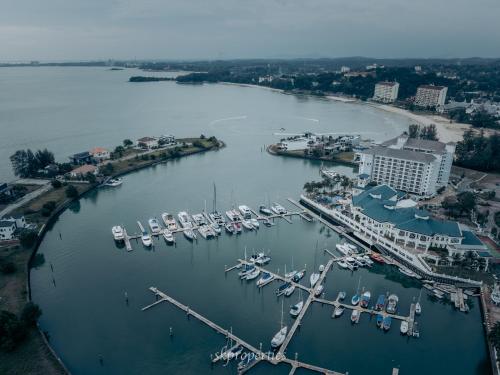 an aerial view of a marina with boats in the water at Seaview Suites at Admiral Bay in Port Dickson