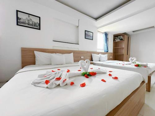 Postel nebo postele na pokoji v ubytování H79 HOTEL