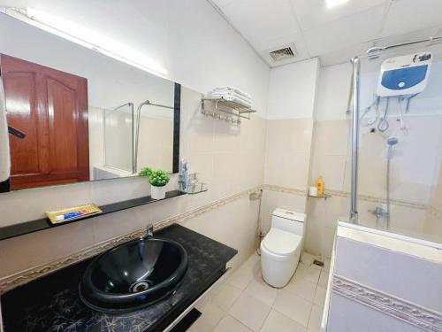 Koupelna v ubytování H79 HOTEL