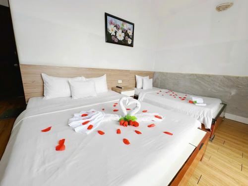 Postel nebo postele na pokoji v ubytování H79 HOTEL