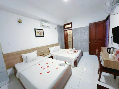 Postel nebo postele na pokoji v ubytování H79 HOTEL