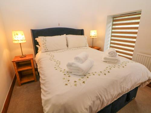 Postel nebo postele na pokoji v ubytování Temperance Croft