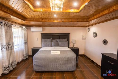 Postel nebo postele na pokoji v ubytování Mathanda Guest House