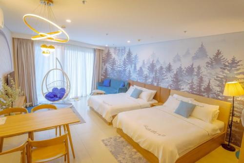 Postel nebo postele na pokoji v ubytování Dứa's House - The Sóng Vũng Tàu, Sky Pool & Gym