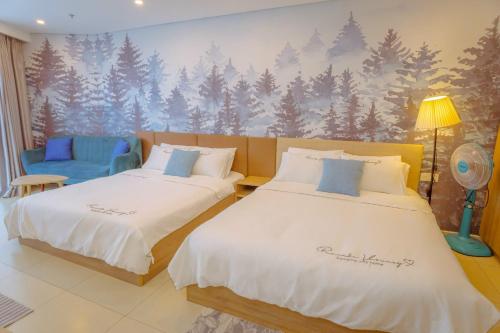 Postel nebo postele na pokoji v ubytování Dứa's House - The Sóng Vũng Tàu, Sky Pool & Gym