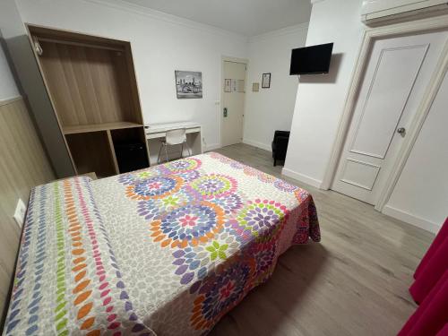 TV a/nebo společenská místnost v ubytování Hotel Dila