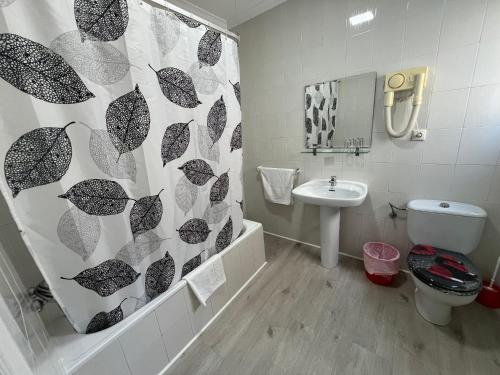 Koupelna v ubytování Hotel Dila