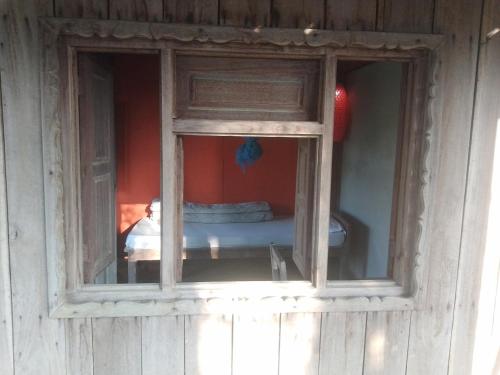 Letto o letti in una camera di Shanta Ghar A Rustic Guesthouse