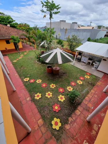 Taman di luar Recanto Aconchego Itapoá