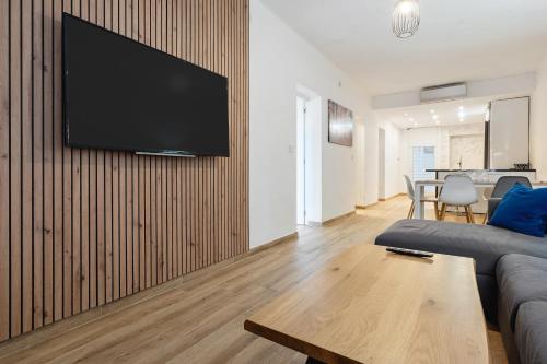 TV a/nebo společenská místnost v ubytování Hauzify I Apartament Ramón Llull