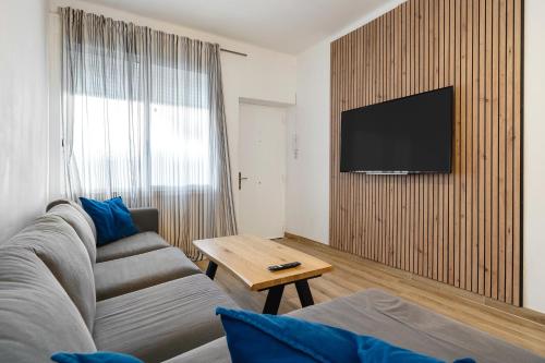 TV a/nebo společenská místnost v ubytování Hauzify I Apartament Ramón Llull