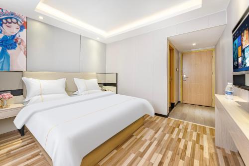 Katil atau katil-katil dalam bilik di Yimi Hotel - Xicun Metro Station Branch