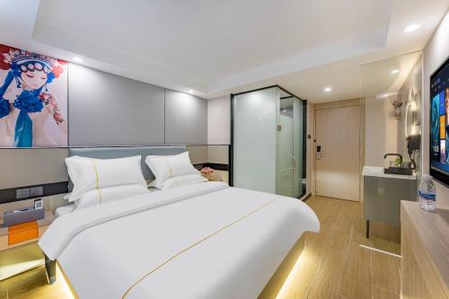 Televisyen dan/atau pusat hiburan di Yimi Hotel - Xicun Metro Station Branch