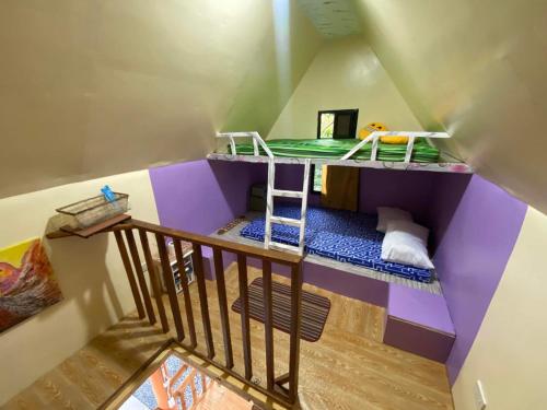 Palanda nebo palandy na pokoji v ubytování Igid Puttot Guest Cabins