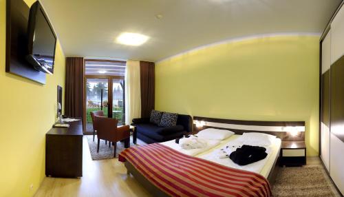 A bed or beds in a room at Luxury Apartment Krištof