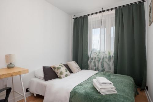 Posteľ alebo postele v izbe v ubytovaní Wola Lavish Apartment