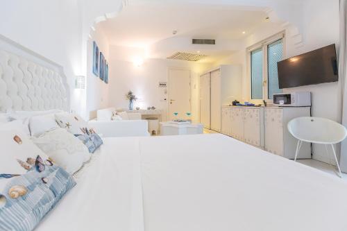 Ένα ή περισσότερα κρεβάτια σε δωμάτιο στο Hotel Al Cavallino Bianco
