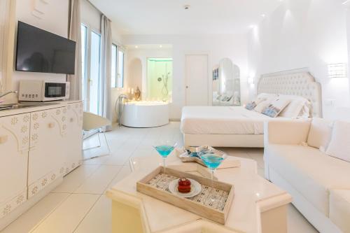 Μια τηλεόραση ή/και κέντρο ψυχαγωγίας στο Hotel Al Cavallino Bianco