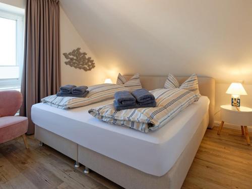 Ένα ή περισσότερα κρεβάτια σε δωμάτιο στο Beach House Langeoog