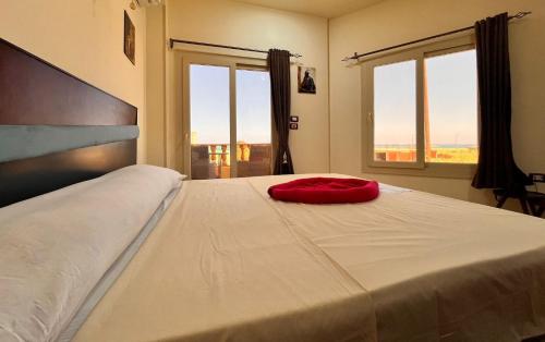 Postel nebo postele na pokoji v ubytování Reef House