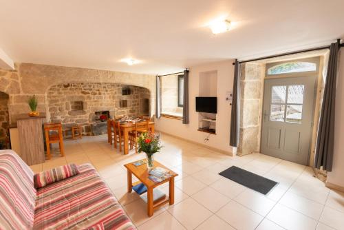 Posezení v ubytování Gîte Gîte 4/6 personnes à la Ferme Lionnet