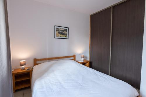 Postel nebo postele na pokoji v ubytování Gîte Gîte 4/6 personnes à la Ferme Lionnet