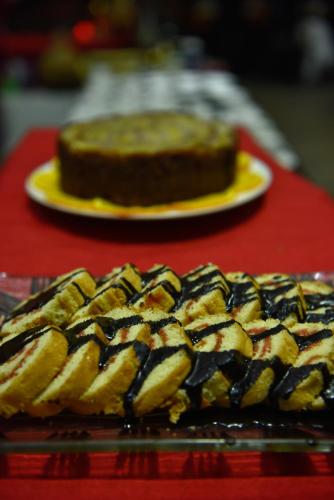 a plate of food with a chocolate cake on a table at Mara Chui Eco-Resort in Sekenani