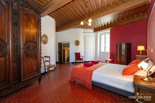 Katil atau katil-katil dalam bilik di Le Château d'Aiguèze