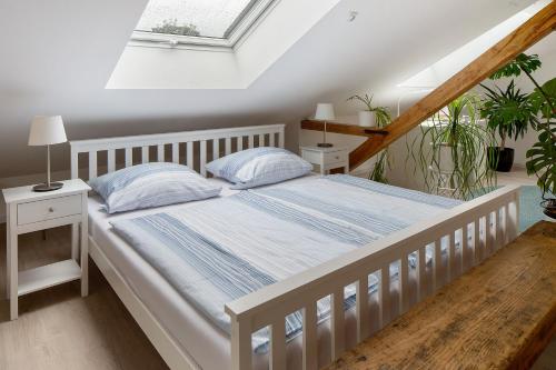 Katil atau katil-katil dalam bilik di Ferienhaus Engelsberghof