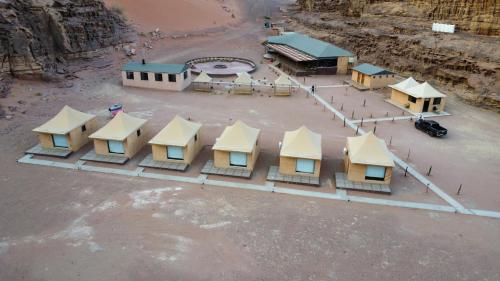 an overhead view of a building with yellow roofs at Lulua luxury camp in Wadi Rum