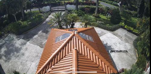 an overhead view of a house with an orange roof at Quinta Las Victorias in Valle de Anton