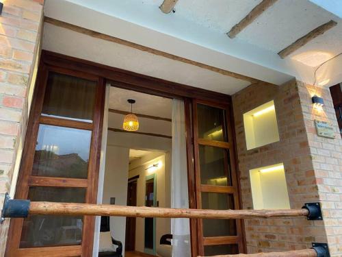 a view of a room with glass doors at Casaboutiquemariajose in Guadalupe