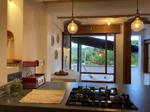 Una cocina o cocineta en Casaboutiquemariajose