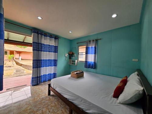Postel nebo postele na pokoji v ubytování Koh Ngai Kaimuk Thong Resort