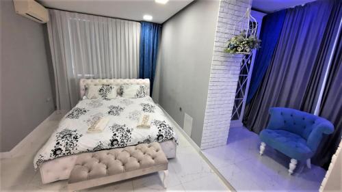 Postel nebo postele na pokoji v ubytování Small Lux Apartment