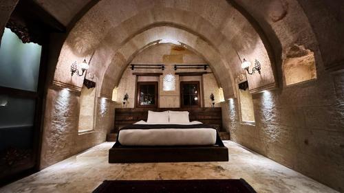 Ένα ή περισσότερα κρεβάτια σε δωμάτιο στο Rocca Stone Suite