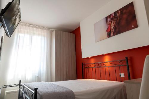 Ένα ή περισσότερα κρεβάτια σε δωμάτιο στο VILLA FENIX OSIO SOTTO 2